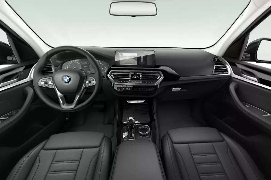 The X3's redesigned cockpit A picture of the front cabin of the BMW X3