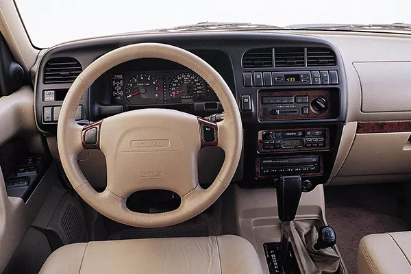 Check out that faux wood A picture of the interior of the Isuzu Trooper