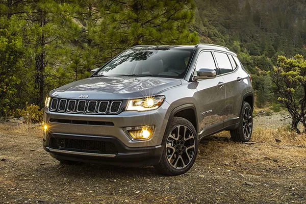 The Jeep Compass is priced at Php 1,850,000 A Jeep Compass in a forest