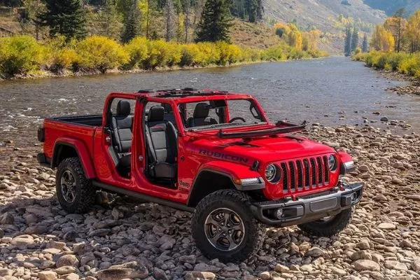 A picture of the Jeep Gladiator parked on a dry river bed