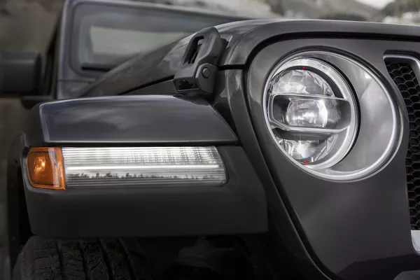 headlight and turn signal of the Jeep Wrangler Unlimited Sahara 2018 