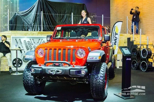 A picture of a red Jeep Wrangler Rubicon 2019 at MIAS