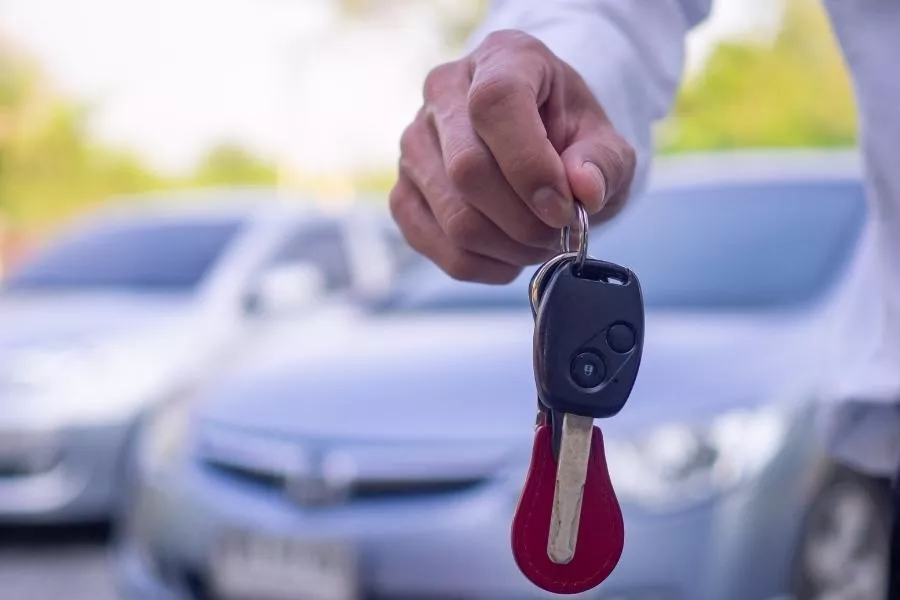 Handing over a car key