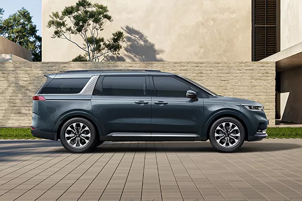 A picture of the side of the new Kia Carnival.