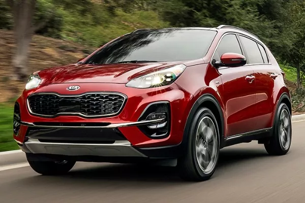 Kia Sportage driving down the road