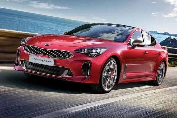 The spacious and powerful Kia Stinger GT A picture of the Kia Stinger GT on the road.