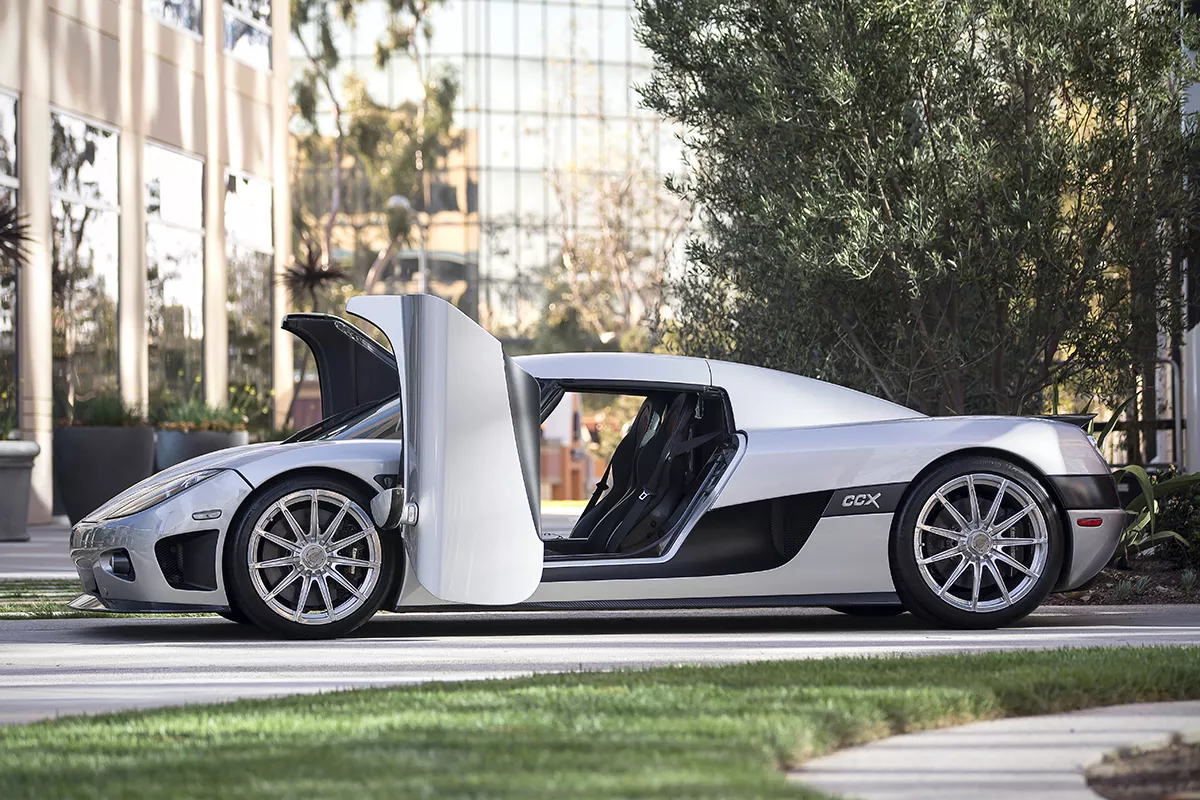 A picture of the side of the Koenigsegg CCX with its doors open