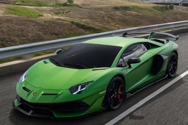 A green Aventador on the road