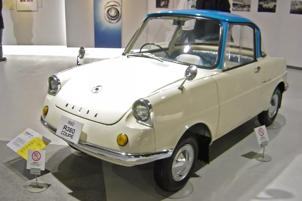 The Mazda R360 in a showroom