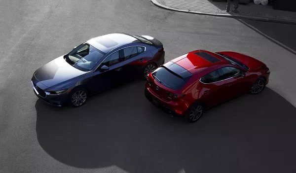 The sedan and Sportback version of Mazda 3 parked side by side A picture of the 2020 Mazda sedan and sportback version side by side