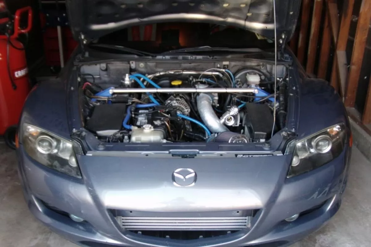 A Mazda RX8 with an LS1 engine. Mazda fans...look away A picture of a Mazda RX8 with an LS1 engine swap.