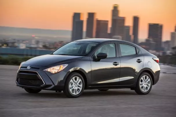 A grey Mazda 2 side view