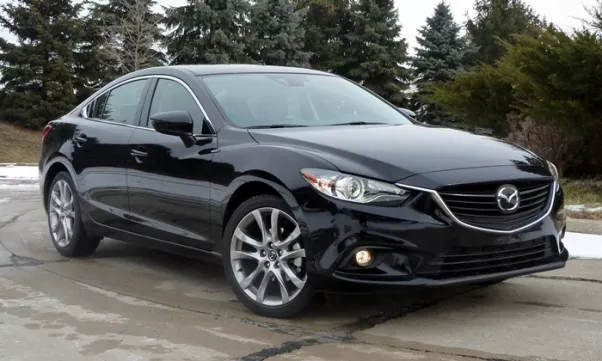 A black Mazda 6 front quarter view