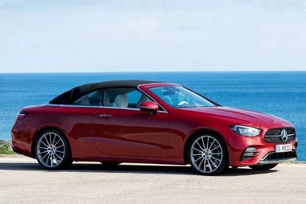 A picture of the E-Class convertible near the ocean