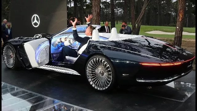 A man sitting on a Mercedes-Maybach Vision 6 Cabriolet