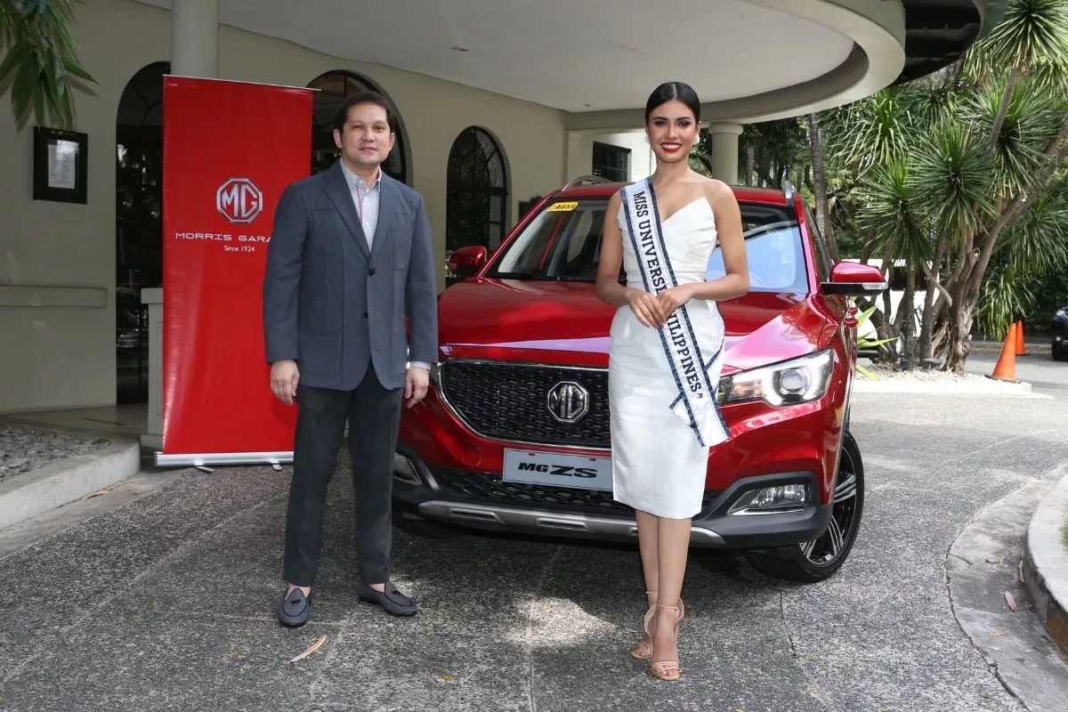 A picture of the reigning Miss Universe Philippines and the MG Philippines president