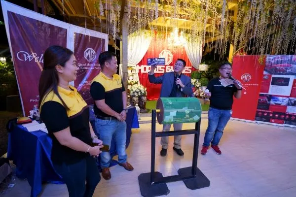 TCCCI execs with the MG Club President drawing the winner for the grand prize