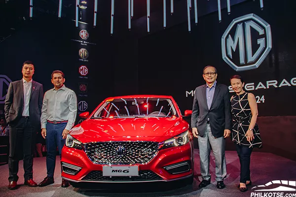 The 2019 MG 6 fastback, launched at the 2019 MIAS A picture of the 2019 MG 6 luxury sedan with MG and SAIC executives
