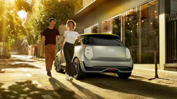 a couple and the Mini Electric Concept