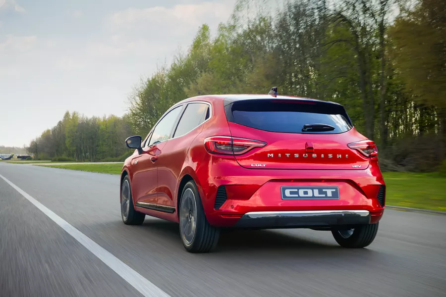 A picture of the rear of the Colt as it travels on the road. 