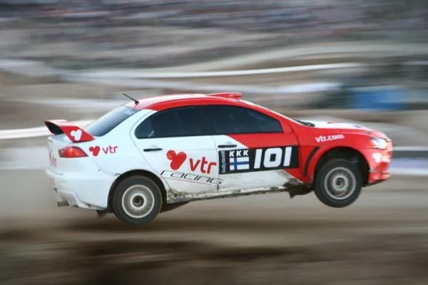 The Lancer Evo, on the other hand, can still fetch a pretty penny nowadays A picture of an EVO performing a jump