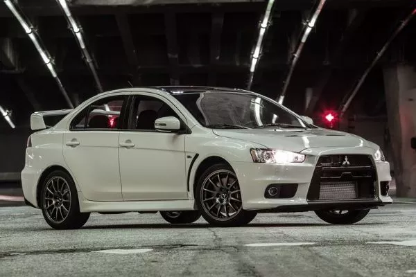 A picture of the Lancer Evo X in a warehouse