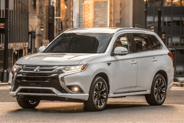 A picture of the Outlander PHEV parked on the side of a road.