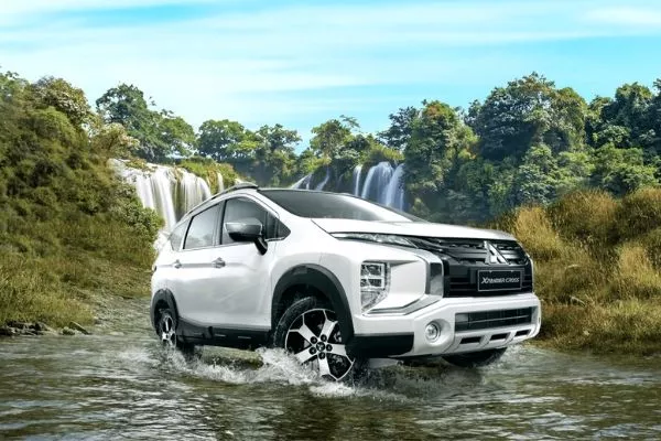 A picture of the 2020 Xpander Cross parked on a river bank