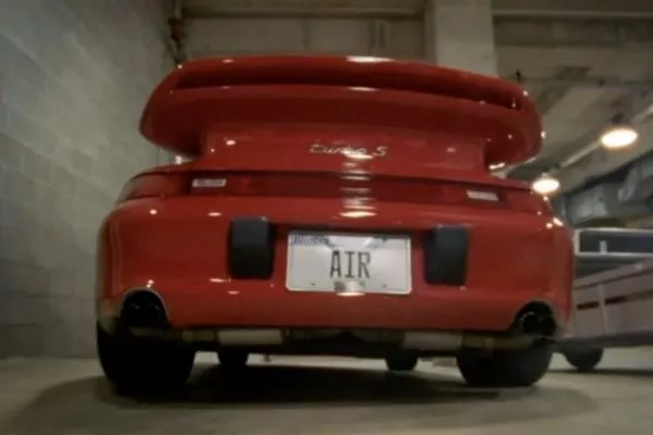 A picture of the rear of MJ's red 911 Turbo S