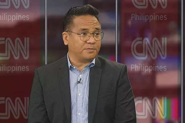 A picture of Bong Nebrija during an interview with CNN