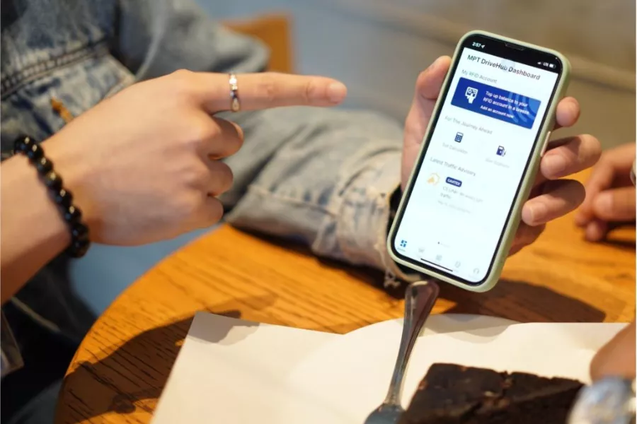 A picture of a person using the MPT DriveHub App