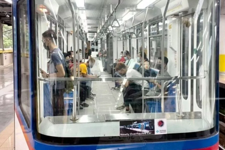 A picture of passengers in a train