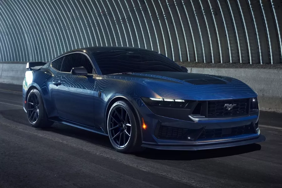 A picture of the 2024 Ford Mustang Dark Horse on the road