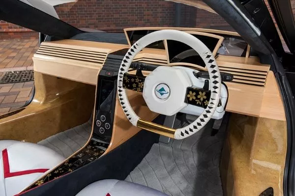 If a production vehicle gets a similar-looking steering wheel, it would be the coolest thing ever A picture of the NCV's dashboard and steering wheel.