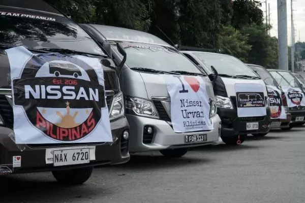 Bunch of Nissan Urvans piled up