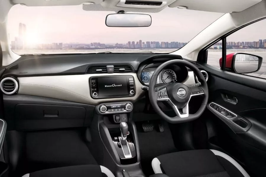 A cabin with a more upscaled look Nissan Almera interior view