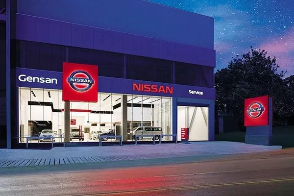 A Nissan dealership at night