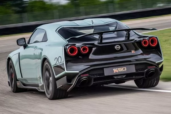 A picture of the rear of the GT-R50 while speeding up on a race track