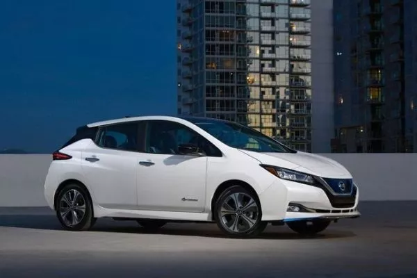 A picture of the Nissan Leaf parked at night