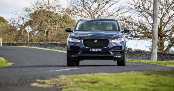 A blue 2018 Jaguar F-Pace front view