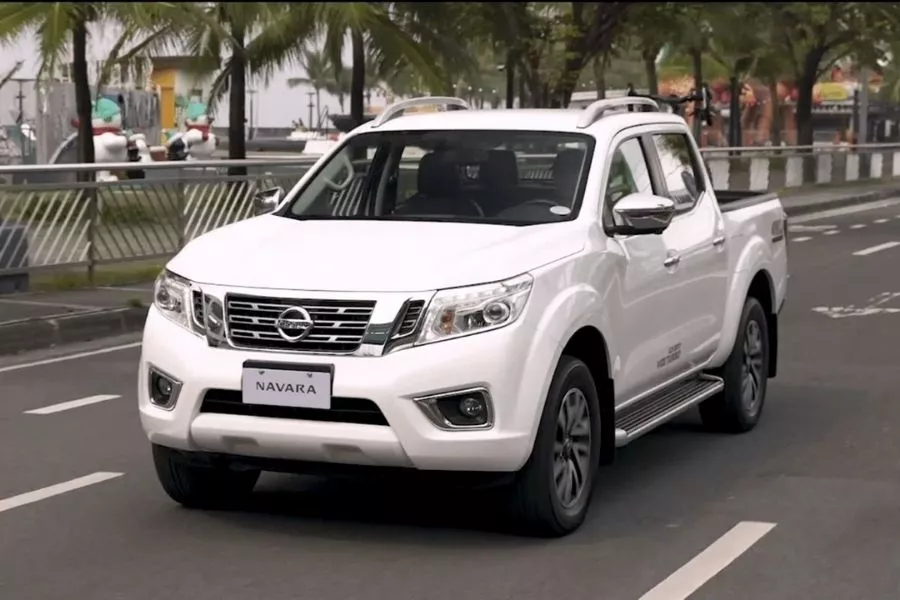 A picture of the outgoing Nissan Navara on the road.