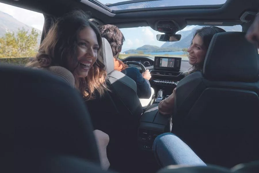 A picture of people inside the 2022 Peugeot 5008