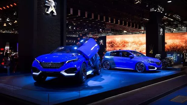 Two blue supercars on display at Frankfurt motor show