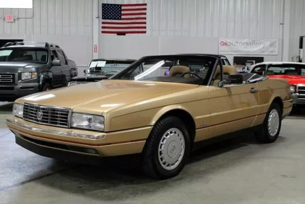 Angular front of the gold Cadillac Allanté
