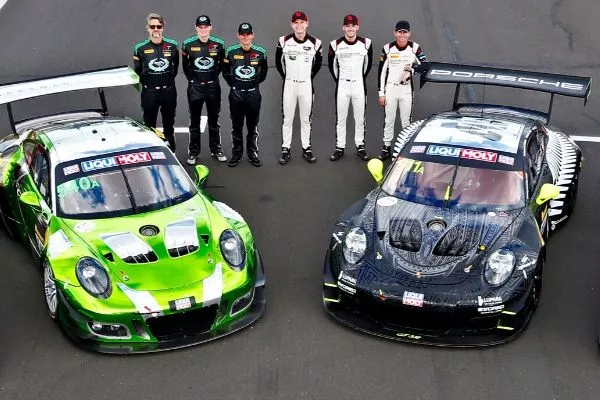 A picture of several Porsche race drivers