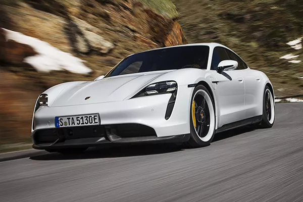 A picture of the Porsche Taycan Turbo S on a highway