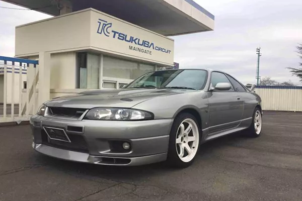 Nissan Skyline GT-R parked at the entrance of the Tsukuba Circuit in Japan 