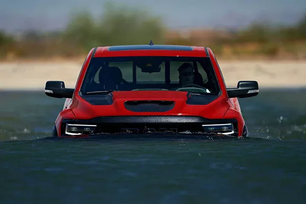 A picture of the Ram TRX fording a river.