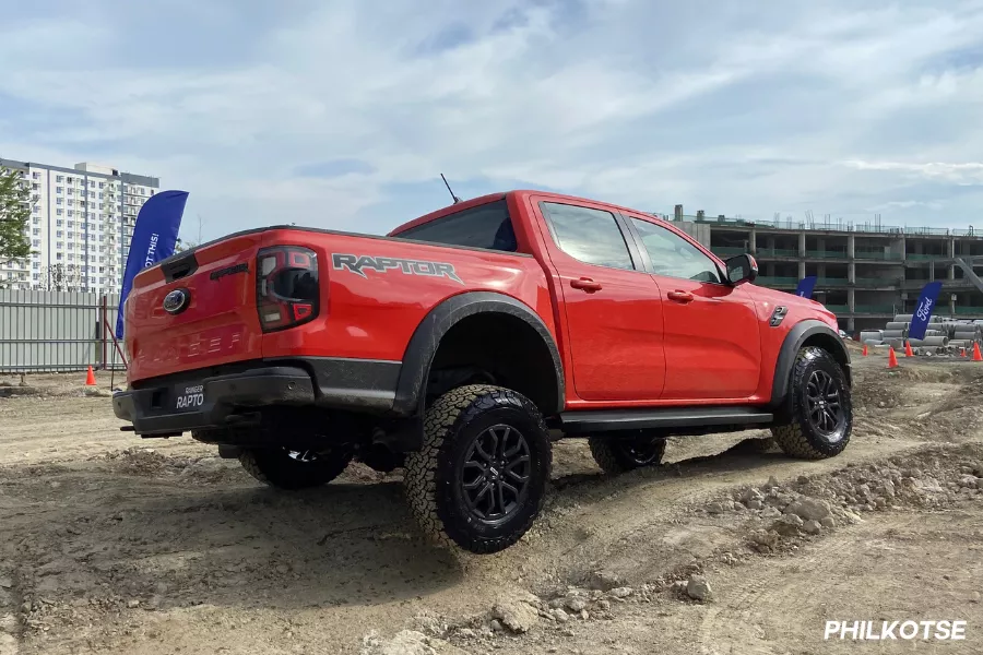 The Philippine-spec next-gen Ranger Raptor from the rear while going off-road A rear quarter shot of the Ford Ranger Raptor
