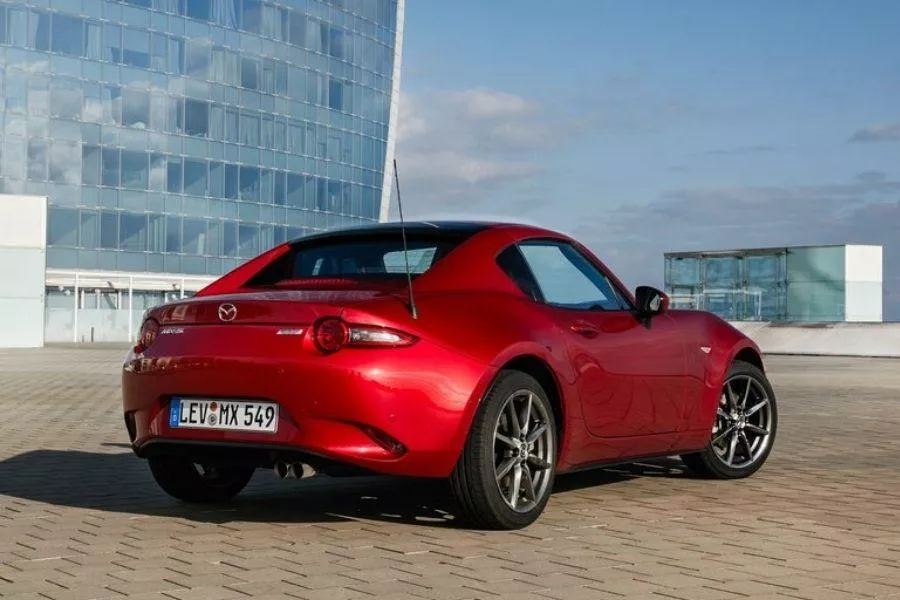 The MX-5 and the MX-5 RF can be a potent track weapon, or an exciting daily driver A picture of the rear of the Mazda MX-5 RF